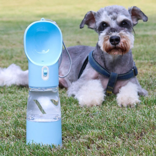 Portable dog water bottle With built in poop bag dispenser and snack Cup